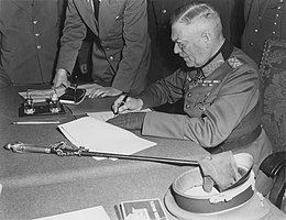 Marshal Keitel signing for peace, to end the war