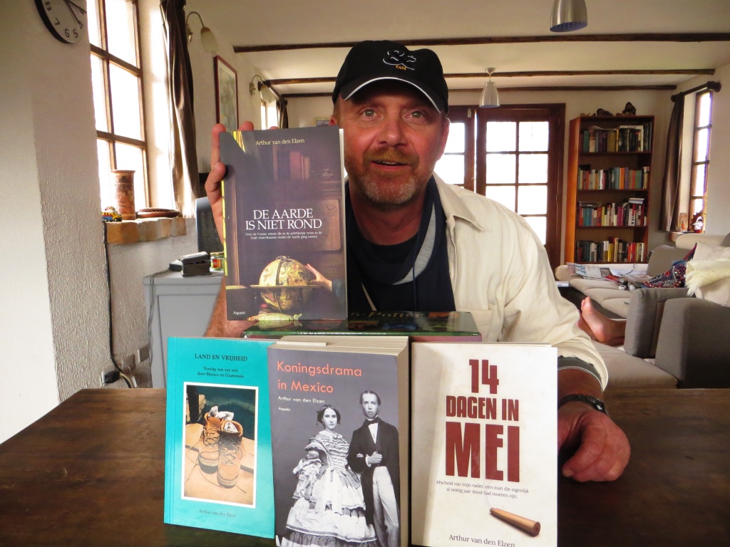 The writer with four of his books