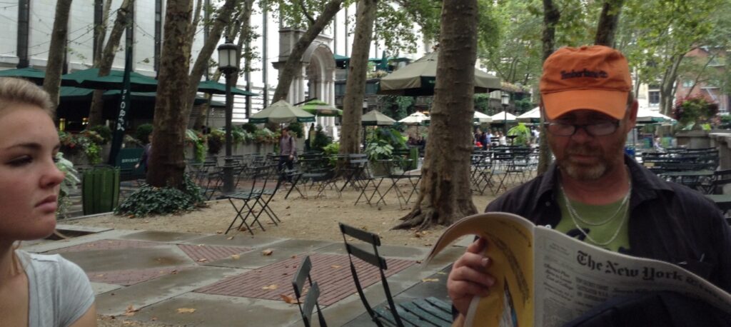 Having a break in Bryant Park, Manhattan, New York. Me, reading the NY times. 