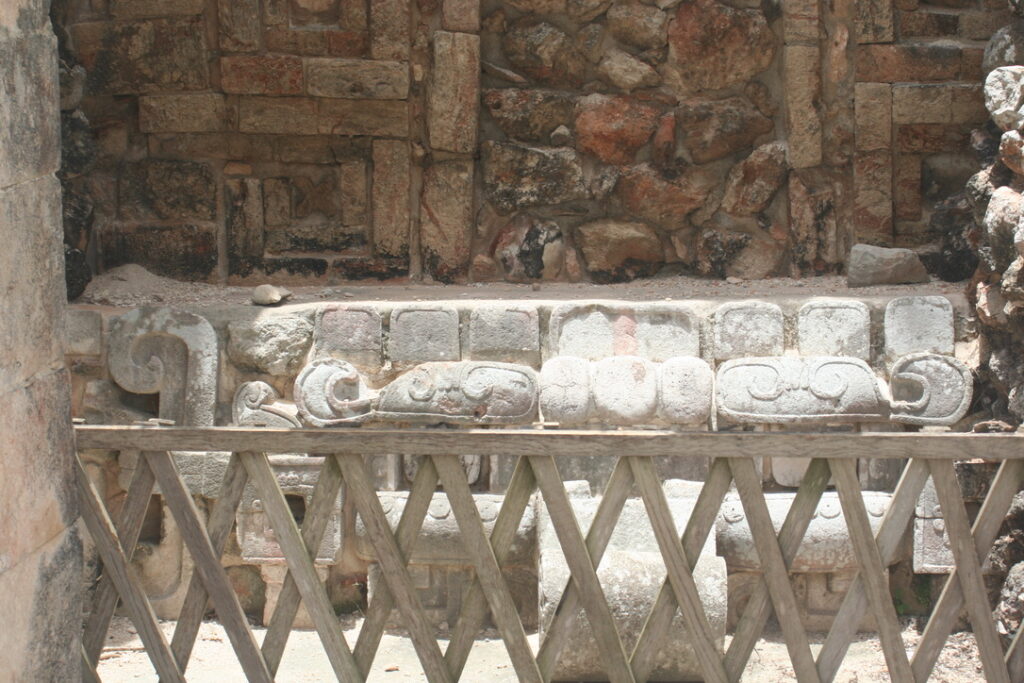Details of interior stucco work in one of the smaller temples of Uxmal. Looks like an altar.    