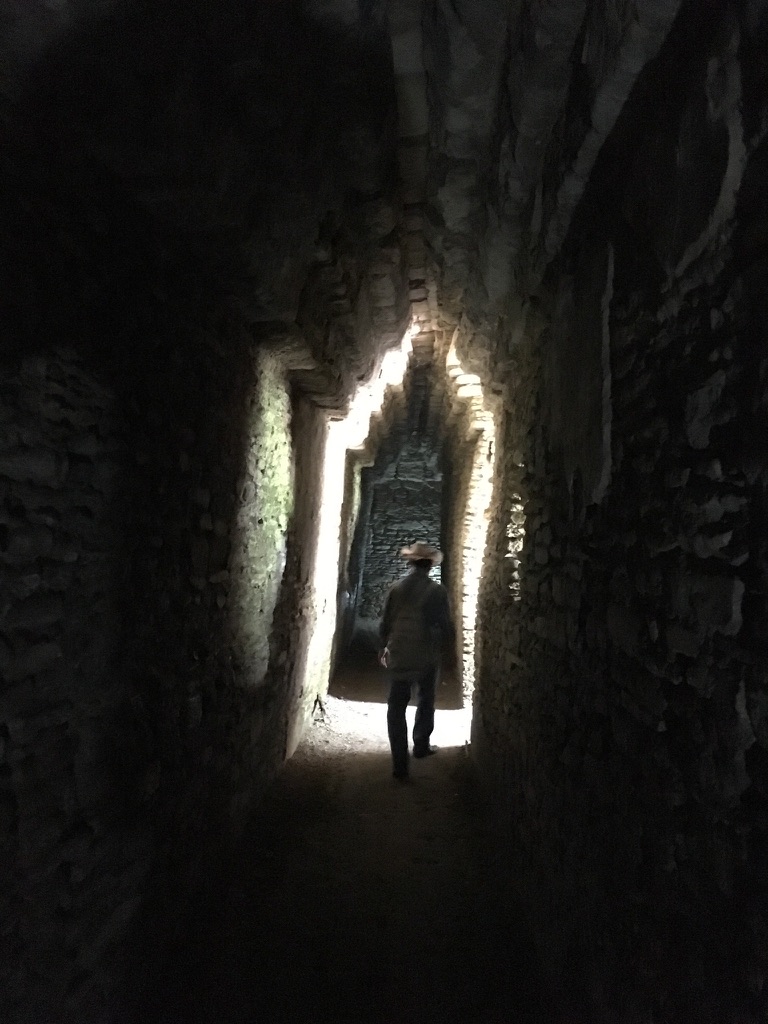 A man walking inside one of the temples of Toniná, Chiapas, México.