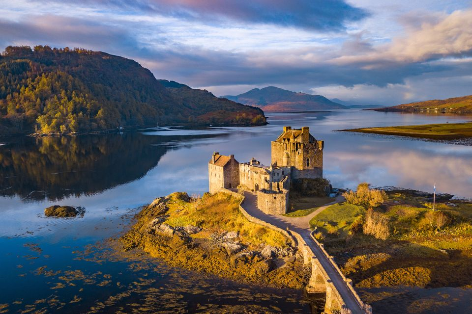 Impressions of the Isle of Skye region, Scotland. Bird-eye view of an old Scottish castle at a beautiful lake.