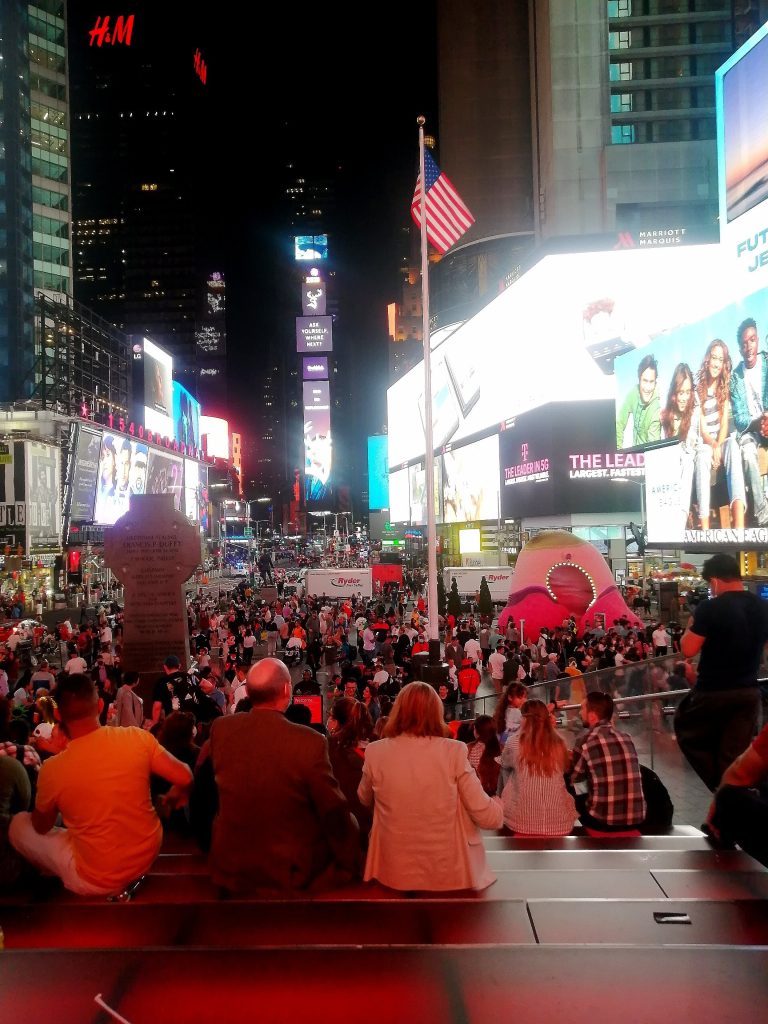 Times Square in the evening. Always busy with people just hanging around.
