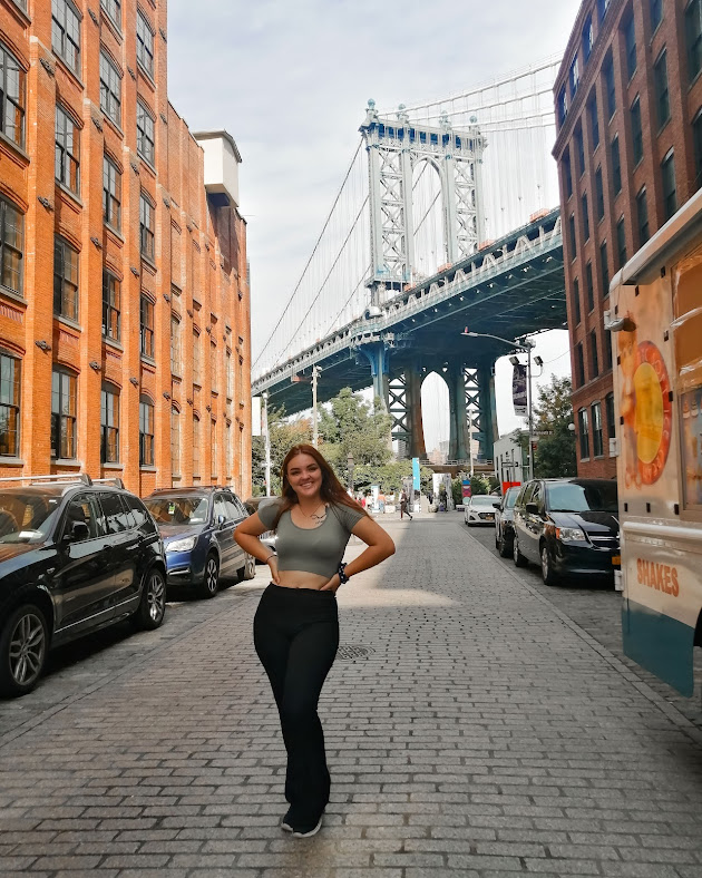 Daughter Lisa at DUMBO, in the background the Brooklyn Bridge to Manhattan, New York