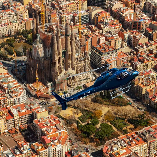 Helicopter flying above the Sagrada Familia, Barcelona.