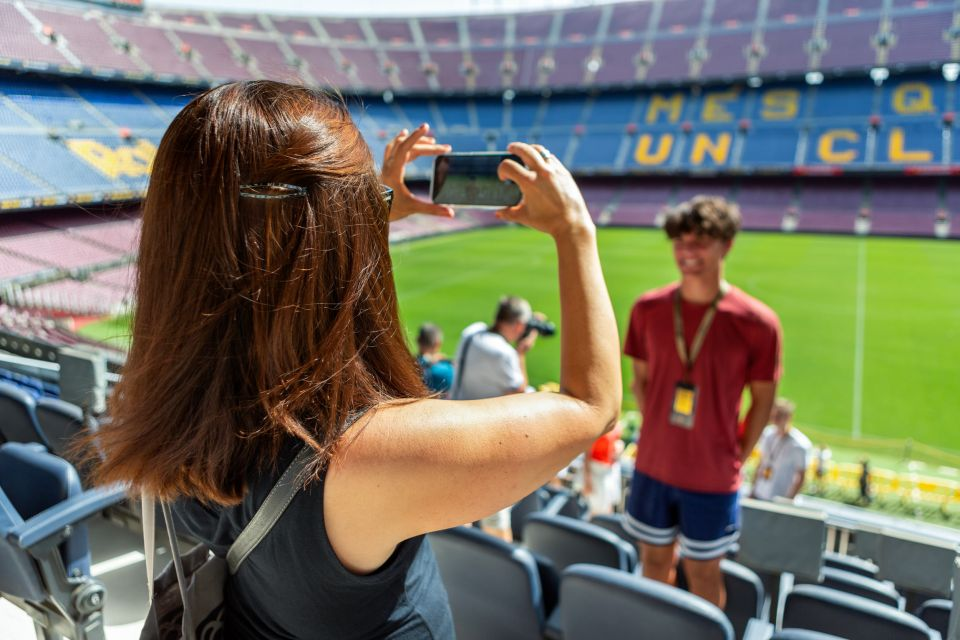 Taking pictures in FC Barcelona stadium Nou Camp.