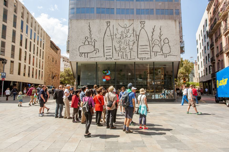 A guided tour group in front of the Picasso Museum in Barcelona, Spain.