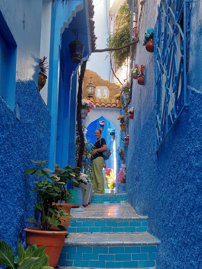 My wife Wendy standing in one of the alleyway of the medina in the blue city of Morocco, Chefchaouen.