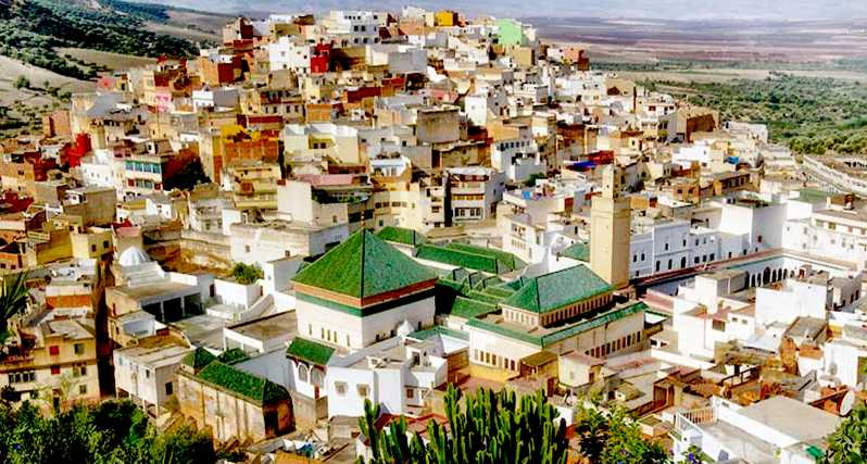 Overview of the Holy City of Moulay Idriss Zerhoun. In the foreground the mosque containing the tomb of Idris I. 