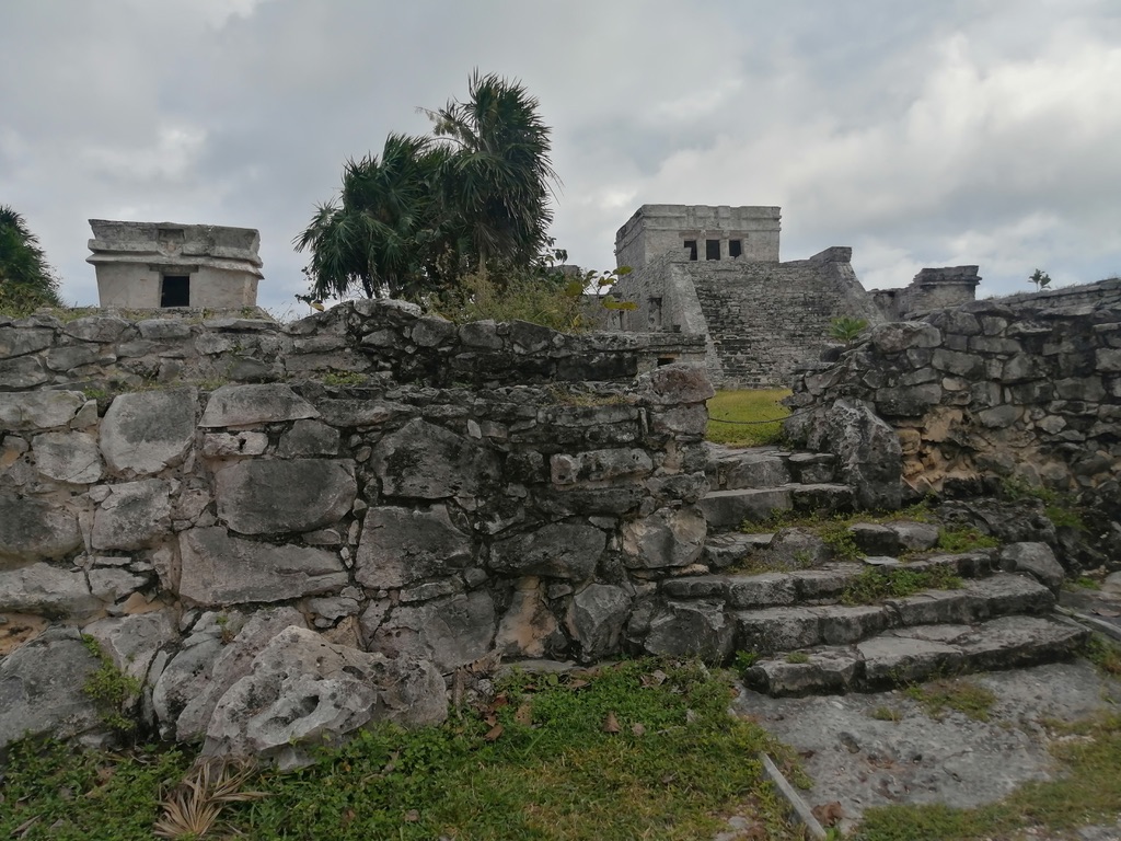 Two temples at Tulum. The one to the right is the main temple, "El Castillo" , which faces inland.