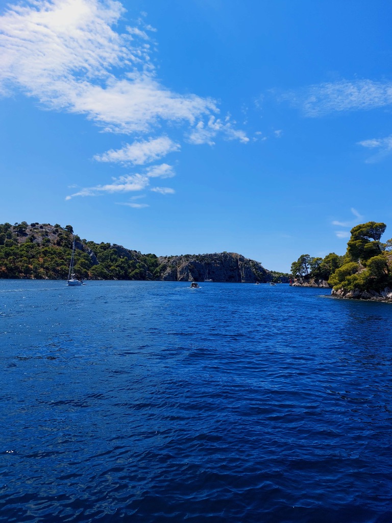 On the water, leaving the port of Šibenik for a day at the beach. 