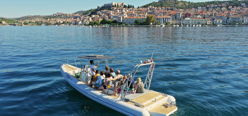 of Šibenik. In the background a view of the mentioned city's coastline.  