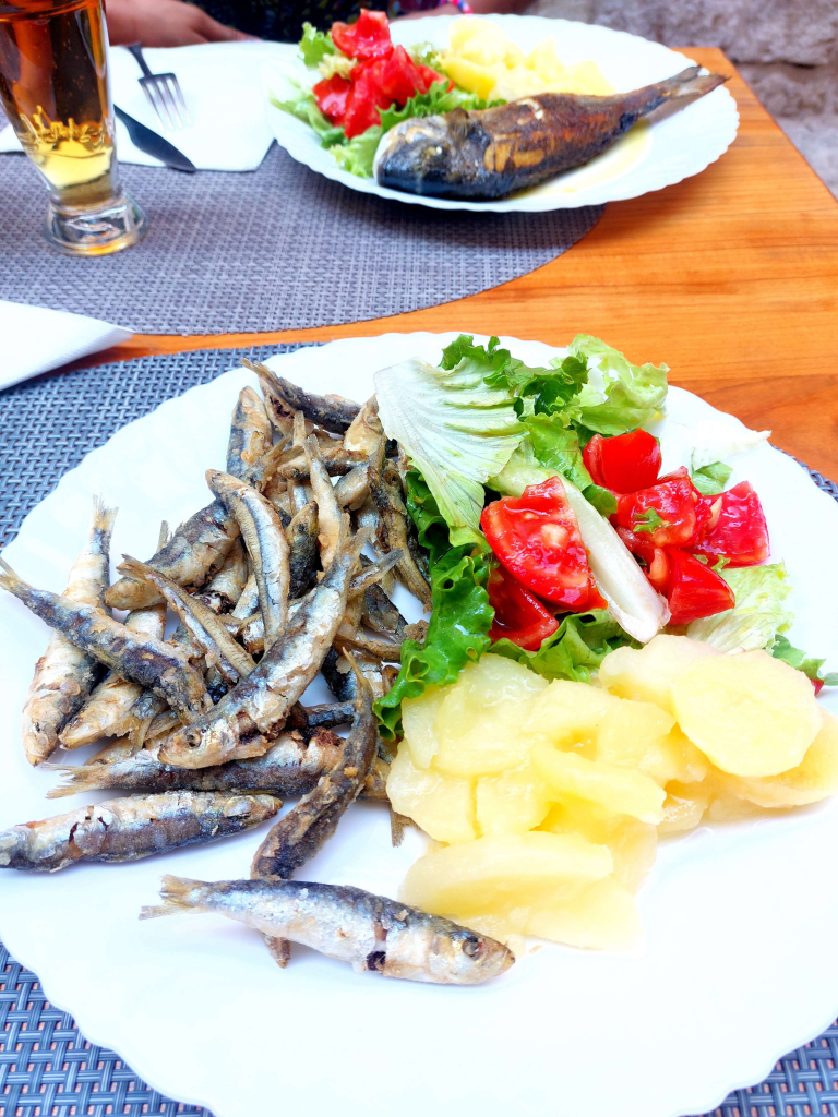 Fresh seafood at the Konoba Marenda. Fried sardines & fish, potatoes & salad.