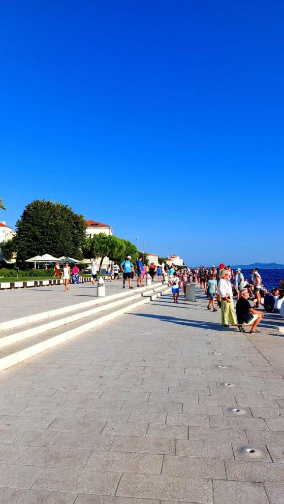 A visit to the lively quay of Zadar. The holes are the exits of the pipes of the Sea Organ. 