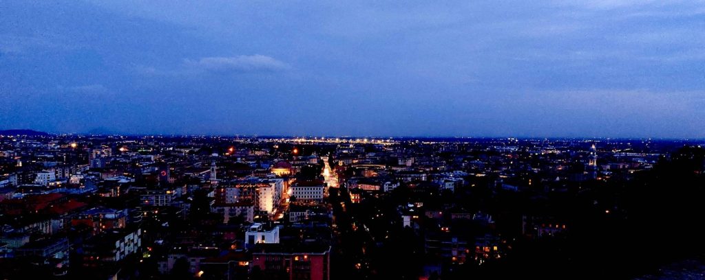 View of the lower city of Bergamo by nightfall.