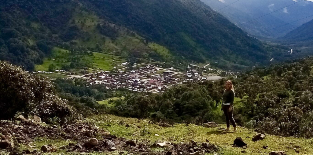 My daughter Lisa standing high above the beautiful, friendly hidden village of Oyacachi, Ecuador.