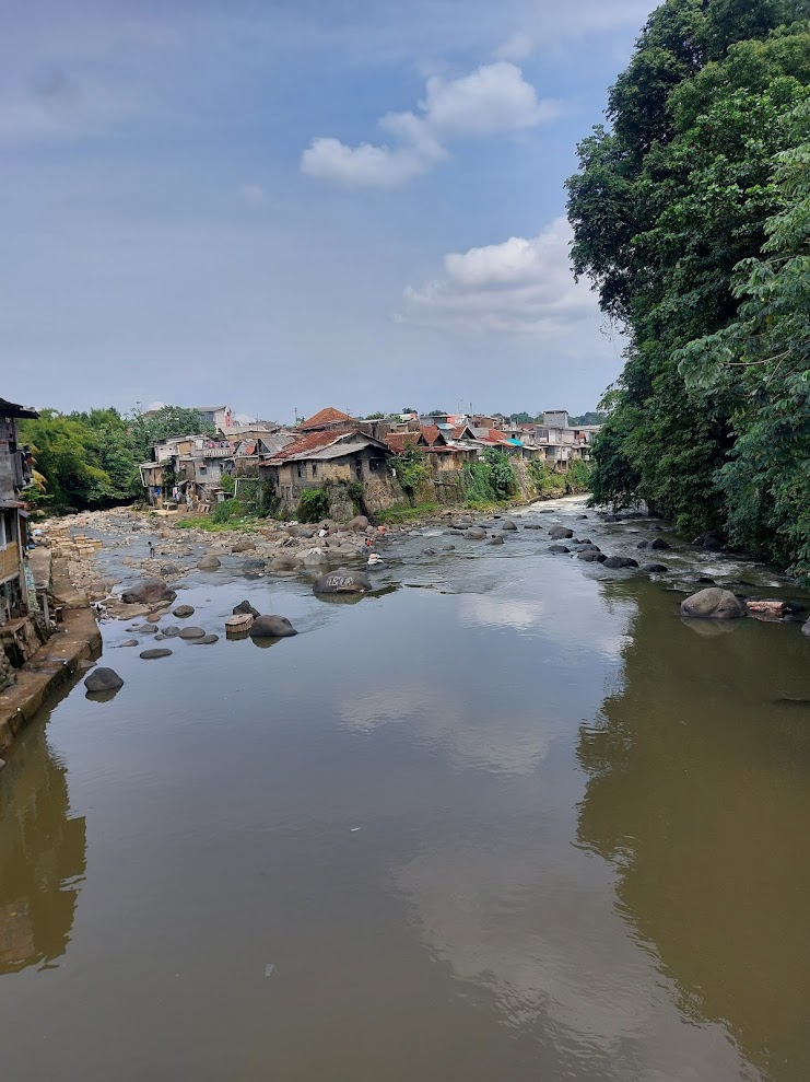 Crossing one of several rivers which traverse Batutulis, Bogor.
