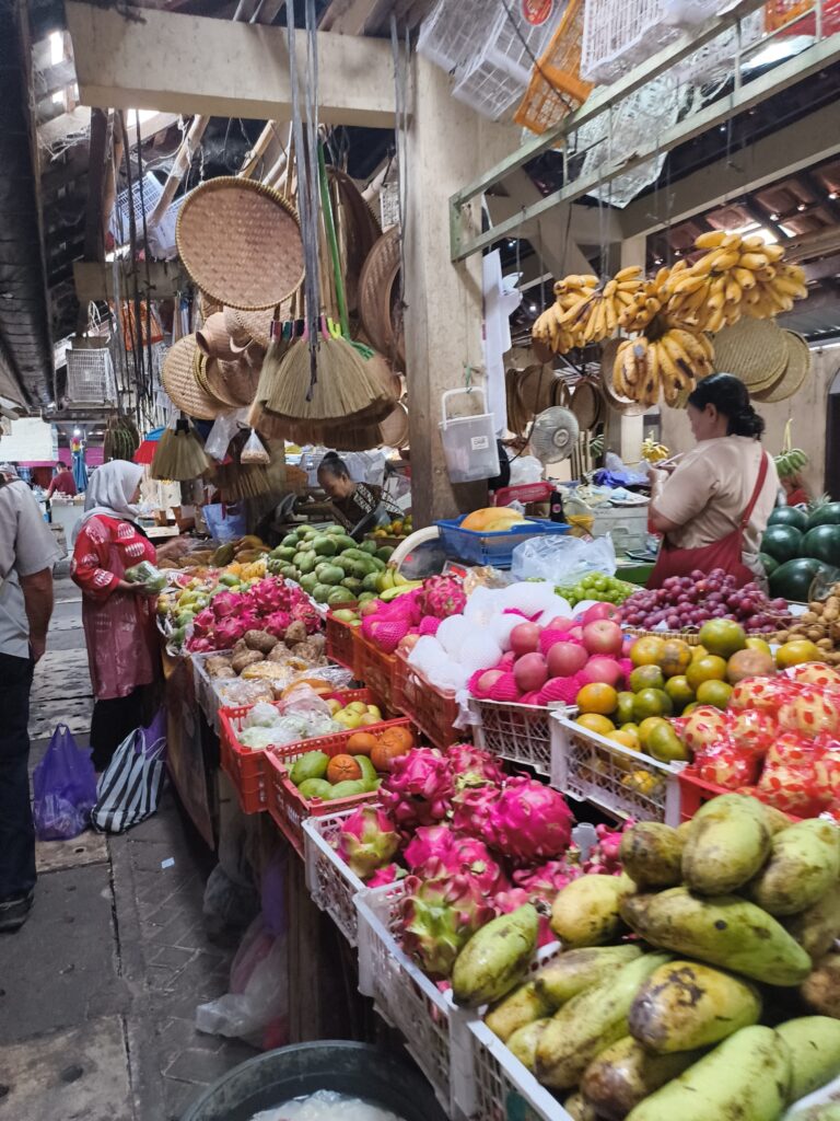 Market stall full of fruit & vegetables at the Pasar Ngasem , Yogyakarta.